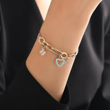 14k Gold | Herringbone Bracelet with Clover & Heart & Star Charms