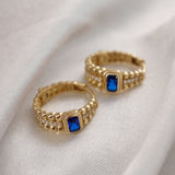 14k Gold | Baugette Blue Zircon Huggie Hoop Earrings with Bezel Setting